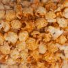 B07BJGL8FH.PT01 Crab Corn kettle corn Family Size bag, close up view.