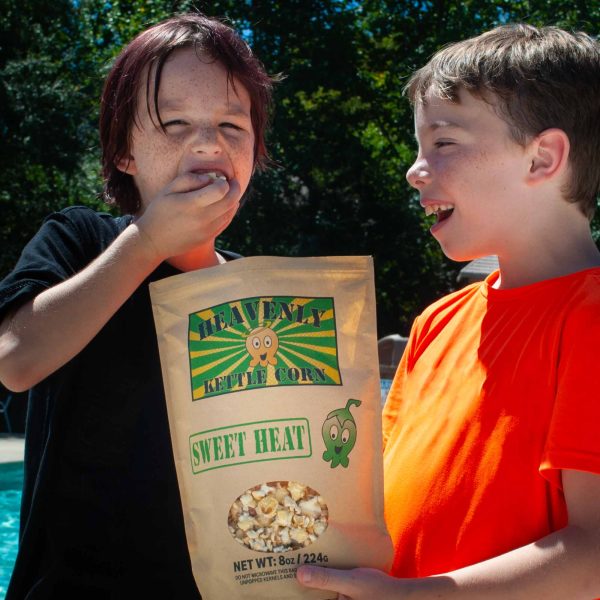 B07BMGZ14W.PT03 Sweet Heat kettle corn Family Size bag, lifestyle.